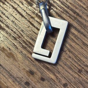 Gucci, Sterling silver G cut out necklace